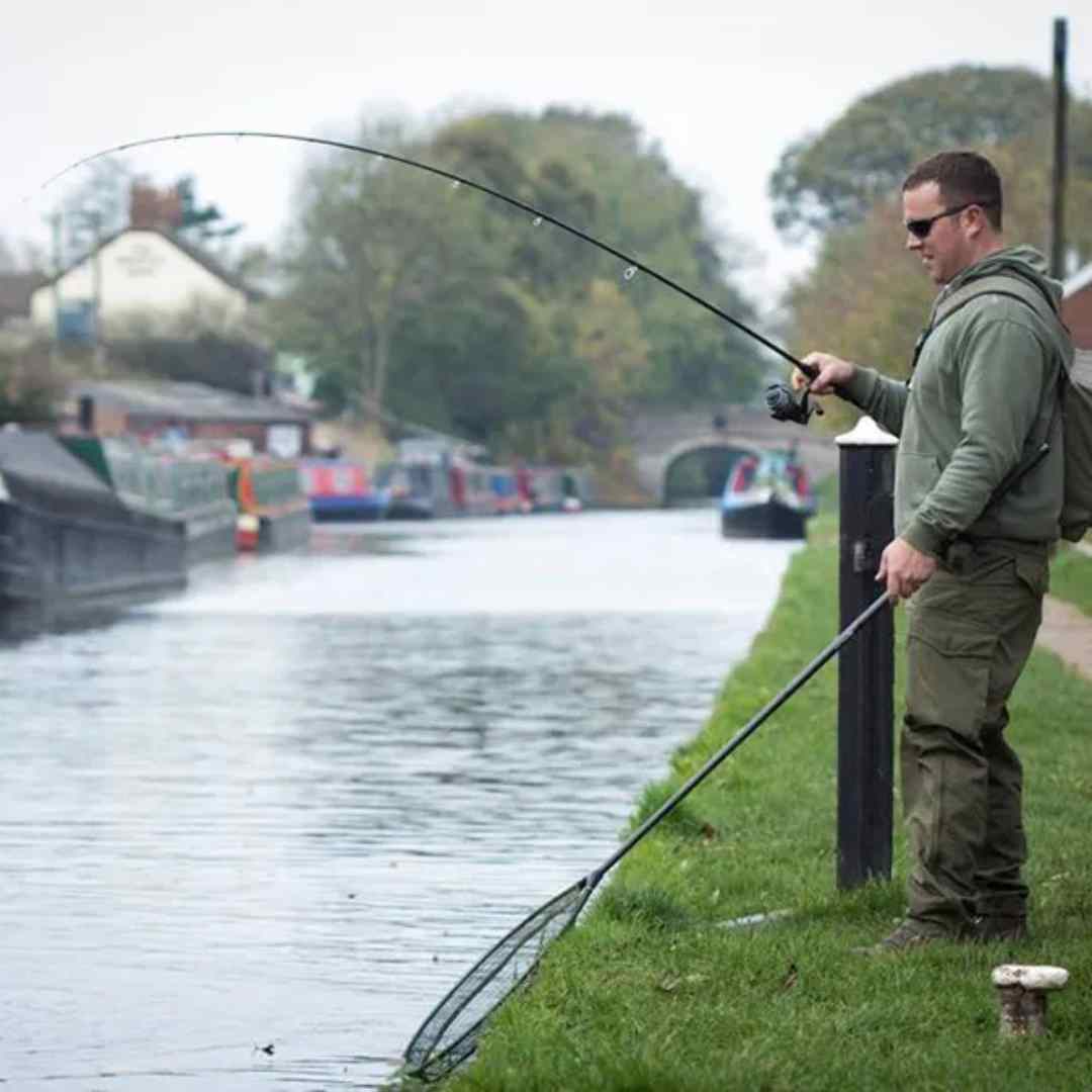 Angler using Perch Fishing  Spoon Net
