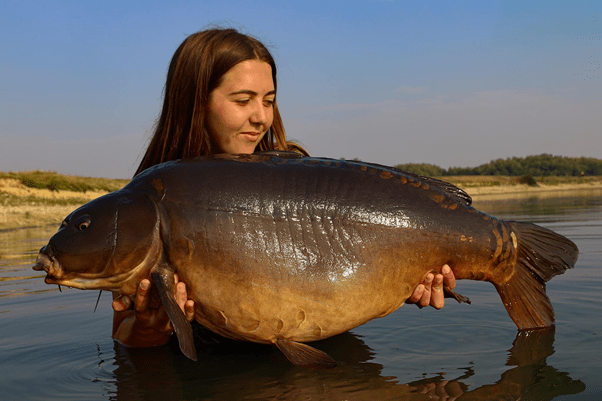 Image of Lauren with her PB Carp - Taken from Lauren Stanford Fishes Facebook