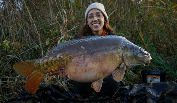 Mandy with her carp catch - Image was taken Carp_Chasers_Mandy Facebook