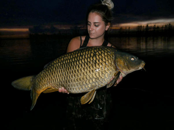 No&eacute;mie with her carp capture - Image taken from Noemie Hehn Facebook
