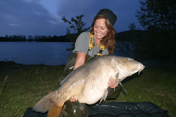 Pat with her carp catch - Image is taken from Pat Goes Fishing Facebook  