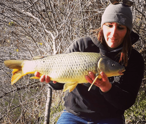 Paulina with her carp catch - Image taken from Facebook Page