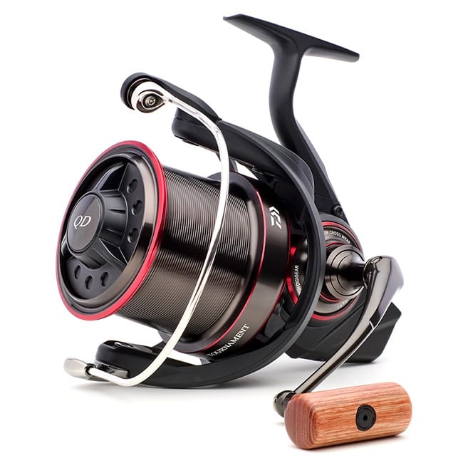 holding a fishing rod Bottom Fishing: Getting Down With Light Tackle