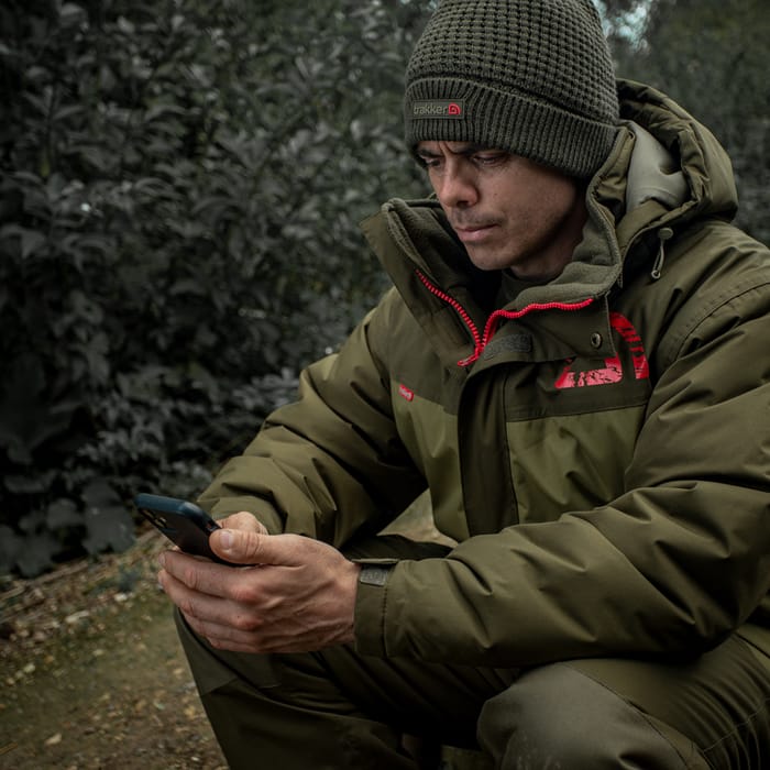 Trakker Core 2-Piece Winter Fishing Suit In Use 2