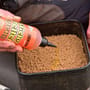Dynamite Swim Stim Sticky Pellet Syrup In Use 3