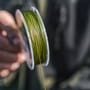 Korum Bopper Bait Up Fishing Braid In Use 1