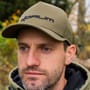 Korum Olive Waterproof Cap In Use 1