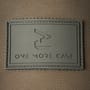 OMC Amur Knight Green Snap Back Fishing Cap Close Up Logo
