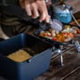 RidgeMonkey Multi-Purpose Fishing Pan And Griddle Set In Use 2