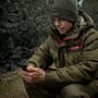 Trakker Core 2-Piece Winter Fishing Suit In Use 2