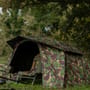 Trakker DPM Tempest Brolly 100 Skull Cap On The Bank