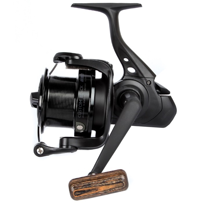 Okuma Custom Black Reel Left View