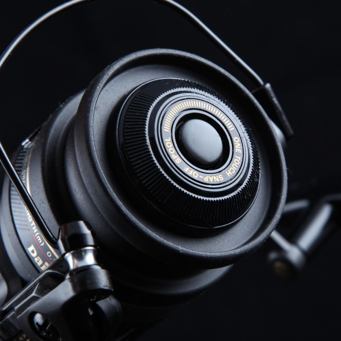 Daiwa 1657DM Match Deluxe Reel Close Up On Black