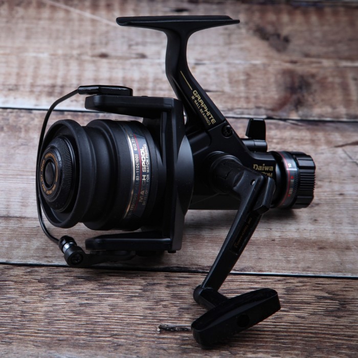 Daiwa 1657DM Match Deluxe Reel Close Up On Wood