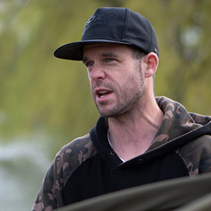 Fox Black & Camo Snapback Fishing Cap In Use