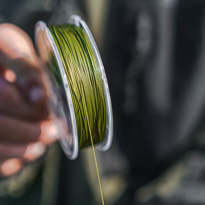 Korum Bopper Bait Up Fishing Braid In Use 1