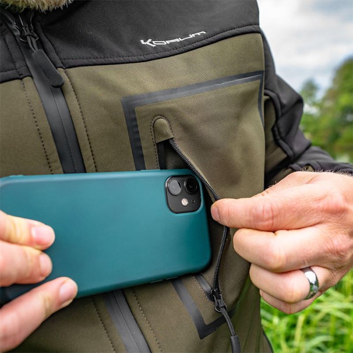 Korum Neoteric Softshell Fishing Jacket Pocket In Use