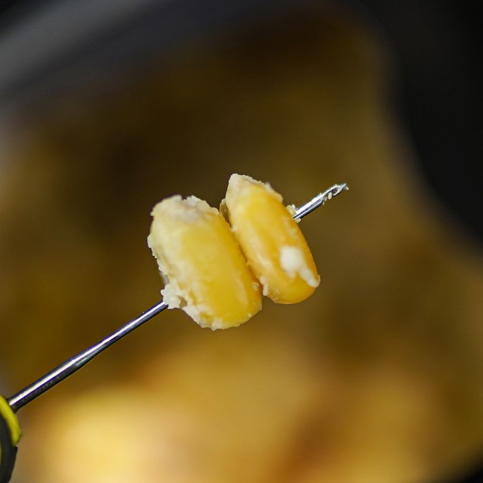 Munch Baits Sweet Maize Fishing Particles 2L In Use