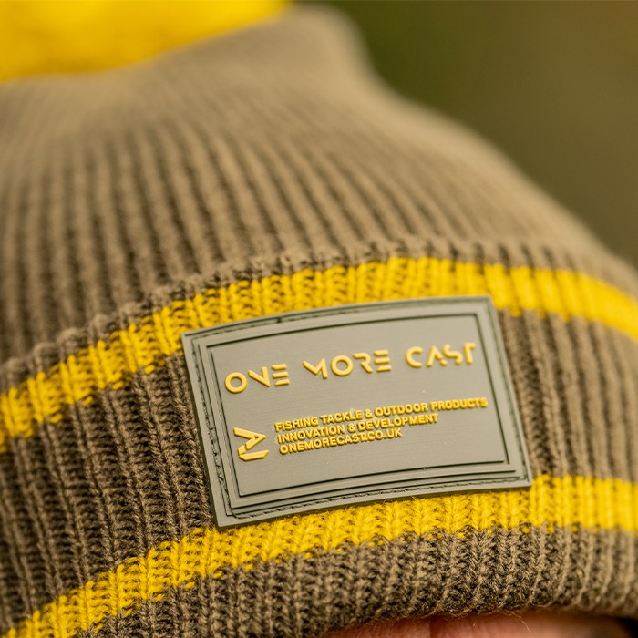 OMC Bobble Green / Mustard Fishing Beanie Close Up 1