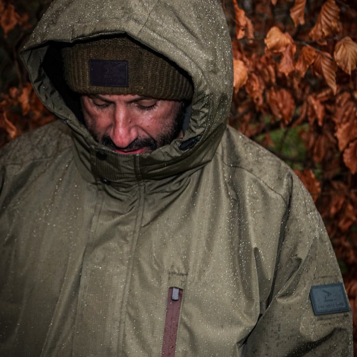 OMC Forest Green Mrigal Spring Water Resistant Fishing Jacket In Use 1