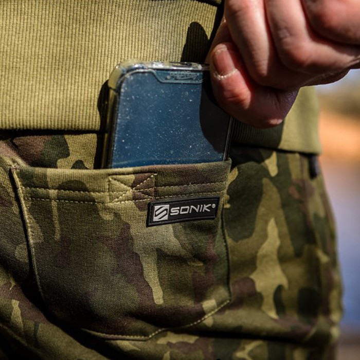 Sonik Camo Fleece Fishing Shorts Close Up Back Pocket In Use