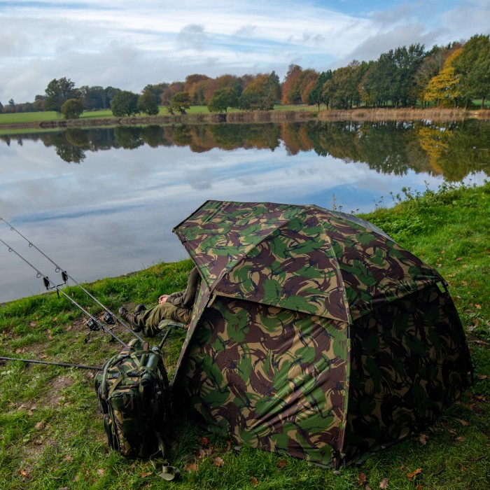 Trakker DPM Tempest Brolly 100 Skull Cap On The Bank In Use